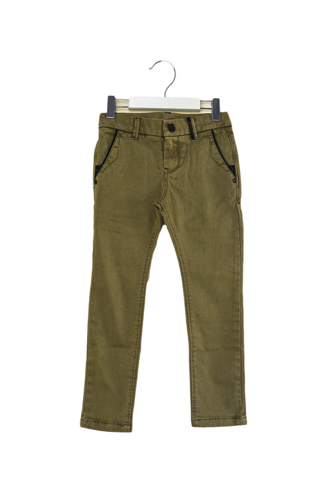 A Green Casual Pants from Catimini in size 5T for girl. (Front View)