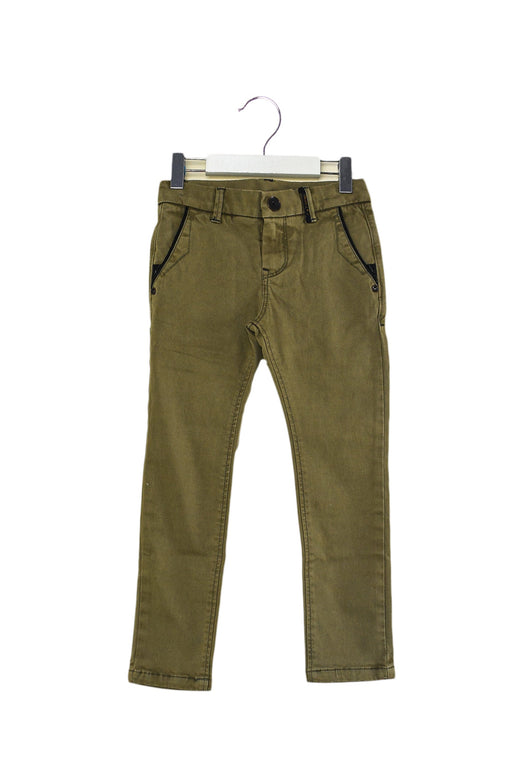 A Green Casual Pants from Catimini in size 5T for girl. (Front View)