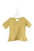 A Beige Short Sleeve Tops from Elfie London in size 6T for girl. (Back View)