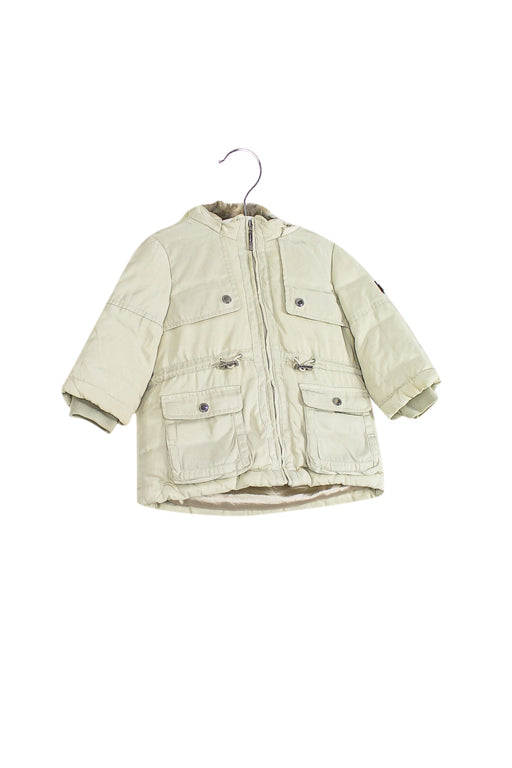 A Ivory Puffer/Quilted Jackets from Nicholas & Bears in size 12-18M for girl. (Front View)