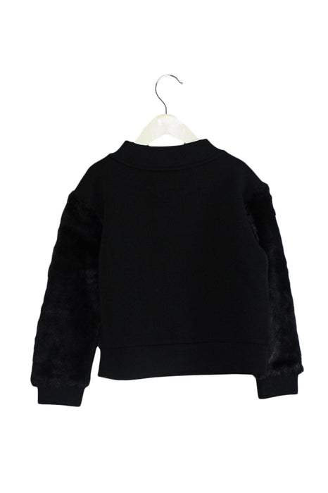 A Black Crewneck Sweatshirts from Armani in size 6T for girl. (Back View)