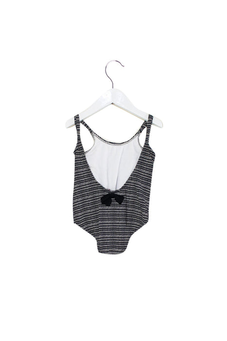 A Black Swimsuits from Emile et Ida in size 4T for girl. (Back View)