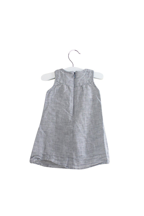 A Grey Sleeveless Dresses from Cyrillus in size 3-6M for girl. (Back View)