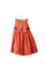 A Orange Sleeveless Dresses from Periwinkle in size 6-12M for girl. (Front View)