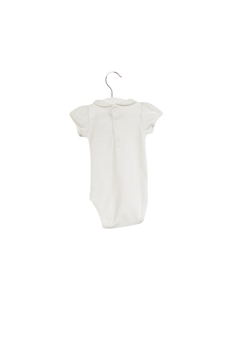 A White Bodysuits from Jacadi in size 0-3M for girl. (Back View)