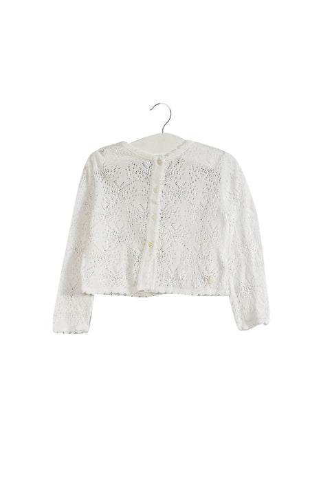 A White Cardigans from Dior in size 6-12M for girl. (Front View)