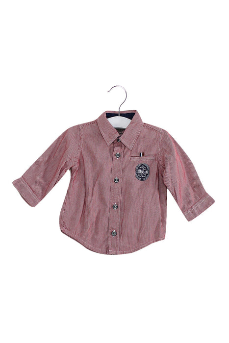 A Red Shirts from Timberland in size 3-6M for boy. (Front View)