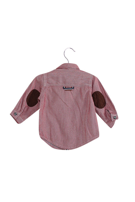 A Red Shirts from Timberland in size 3-6M for boy. (Back View)
