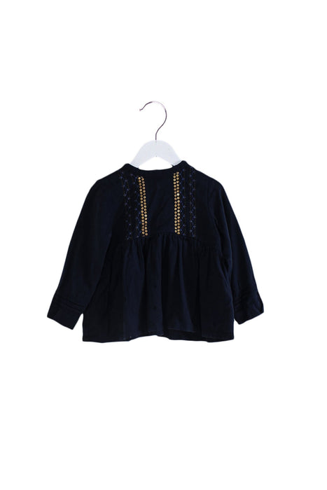 A Navy Long Sleeve Tops from Velveteen in size 4T for girl. (Front View)