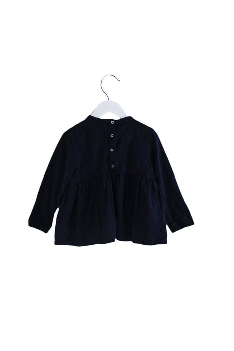 A Navy Long Sleeve Tops from Velveteen in size 4T for girl. (Back View)