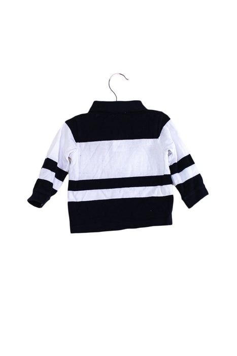A Navy Long Sleeve Polos from Jacadi in size 3-6M for boy. (Back View)