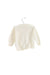 A Ivory Cardigans from Natures Purest in size 12-18M for neutral. (Back View)