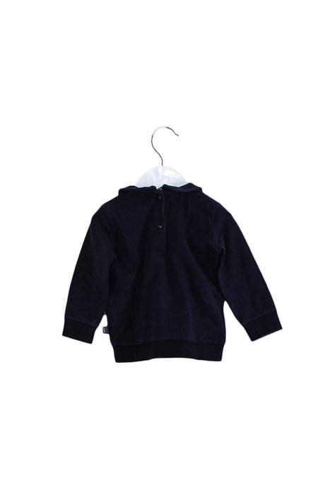A Navy Long Sleeve Tops from Imps & Elfs in size 6-12M for girl. (Back View)