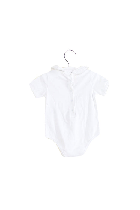 A White Short Sleeve Bodysuits from Nanos in size 6-12M for girl. (Back View)