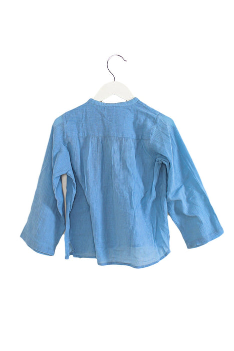 A Blue Long Sleeve Tops from Bonton in size 3-6M for girl. (Back View)