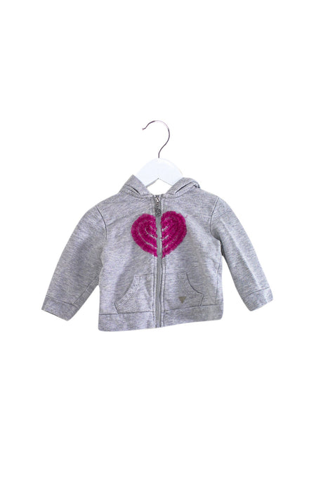 A Grey Lightweight Jackets from Guess in size 6-12M for girl. (Front View)