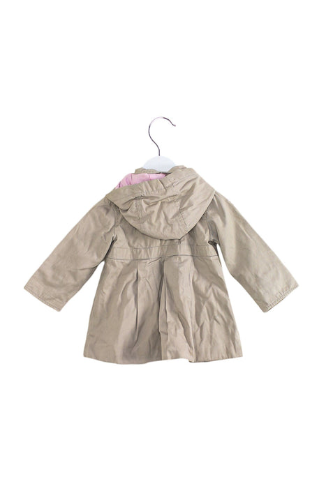 A Taupe Coats from Jacadi in size 6-12M for girl. (Back View)