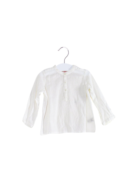 A Ivory Long Sleeve Tops from Bonpoint in size 3-6M for girl. (Front View)