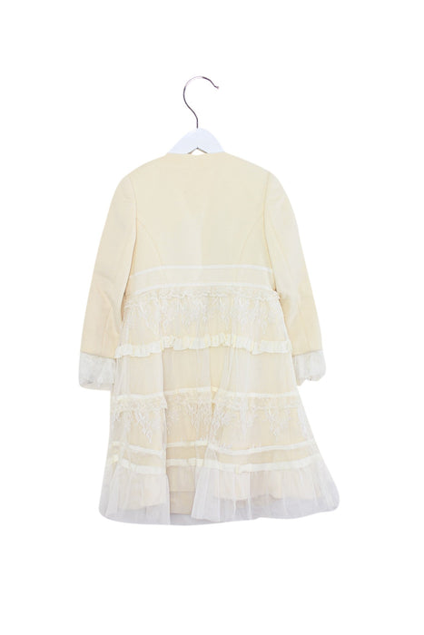 A Ivory Coats from Nicholas & Bears in size 3T for girl. (Back View)