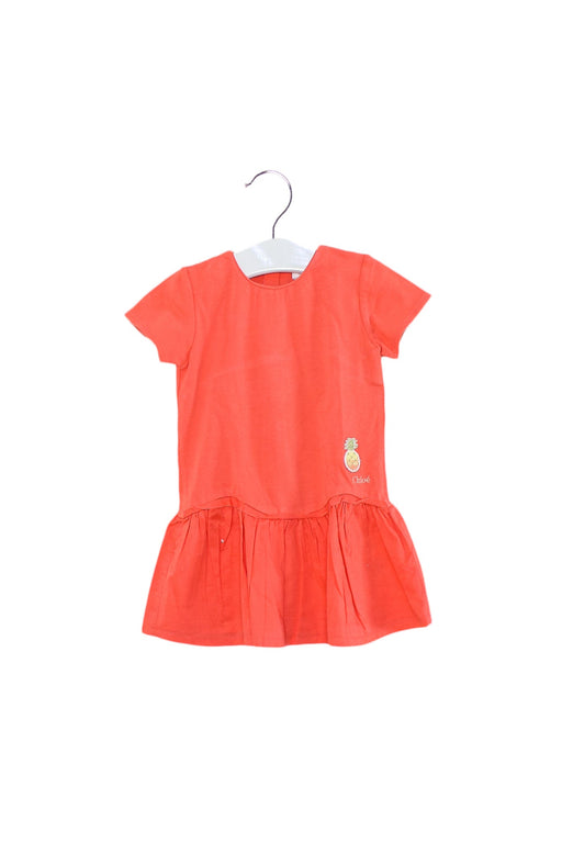 A Orange Short Sleeve Dresses from Chloe in size 6-12M for girl. (Front View)
