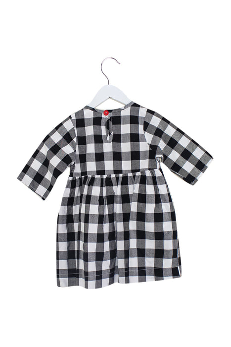 A Grey Short Sleeve Dresses from Smiling Button in size 4T for girl. (Back View)