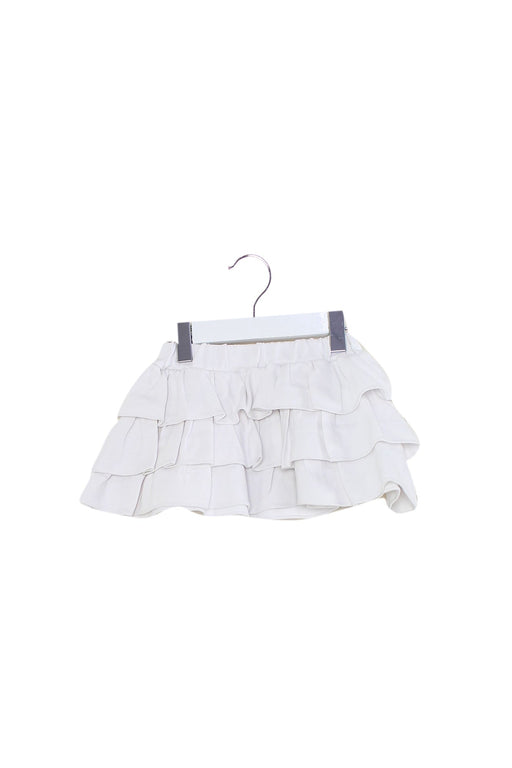 A White Short Skirts from Le Petit Society in size 4T for girl. (Front View)