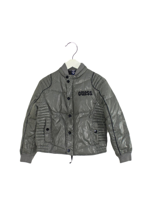 A Grey Puffer/Quilted Jackets from Guess in size 6T for boy. (Front View)