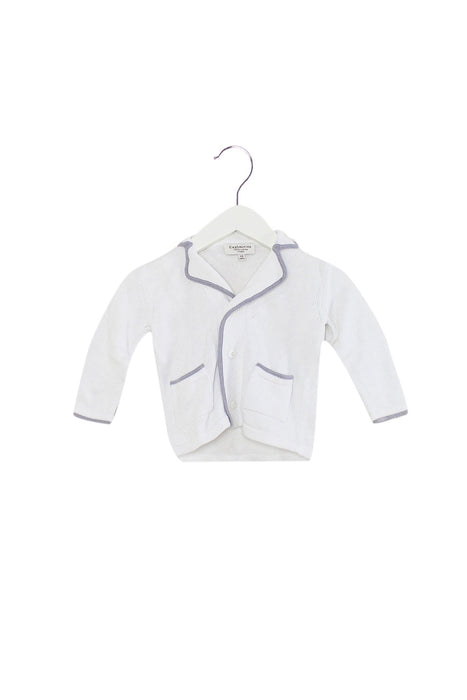 A White Cardigans from Cashmirino in size 6-12M for girl. (Front View)