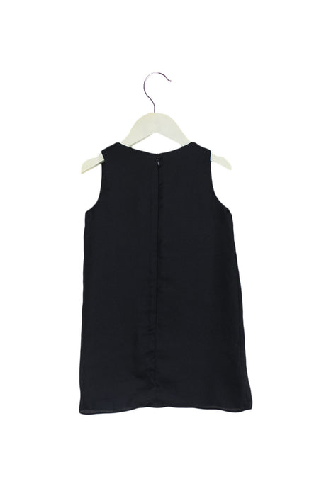 A Black Sleeveless Dresses from Charabia in size 4T for girl. (Back View)