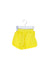 A Yellow Swim Shorts from Seed in size 3-6M for girl. (Front View)