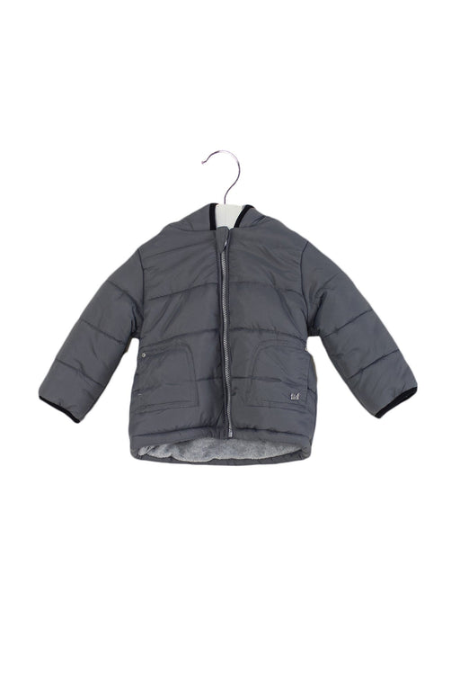 A Grey Puffer/Quilted Jackets from Fox & Finch in size 6-12M for boy. (Front View)