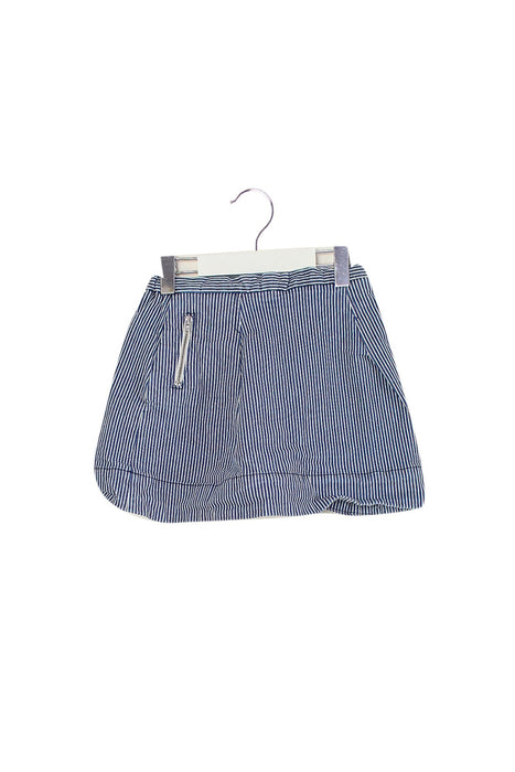 A Blue Mid Skirts from Bonpoint in size 6T for girl. (Front View)