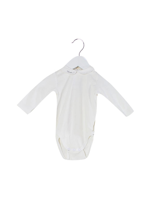 A White Long Sleeve Bodysuits from Jacadi in size 0-3M for girl. (Front View)