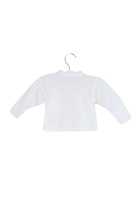 A White Cardigans from Jacadi in size 3-6M for girl. (Back View)