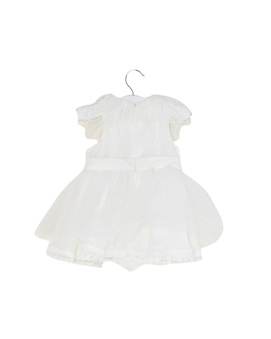 A White Sleeveless Dresses from Nicholas & Bears in size 6-12M for girl. (Back View)