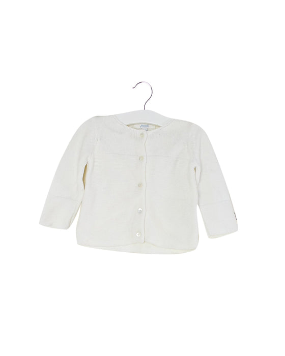 A White Cardigans from Jacadi in size 3-6M for girl. (Front View)