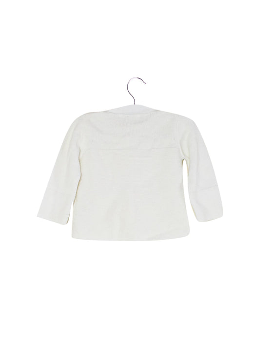 A White Cardigans from Jacadi in size 3-6M for girl. (Back View)