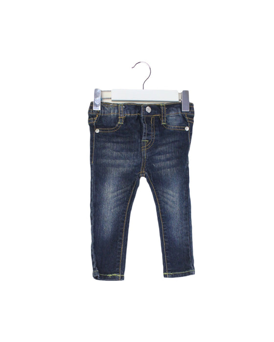 A Blue Jeans from 7 For All Mankind in size 6-12M for girl. (Front View)