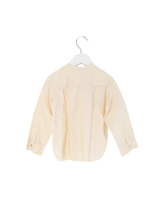 A Beige Long Sleeve Tops from Bonton in size 3T for boy. (Back View)
