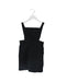 A Black Overall Dresses from Comme Ca Du Mode in size 4T for girl. (Front View)