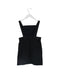 A Black Overall Dresses from Comme Ca Du Mode in size 4T for girl. (Back View)
