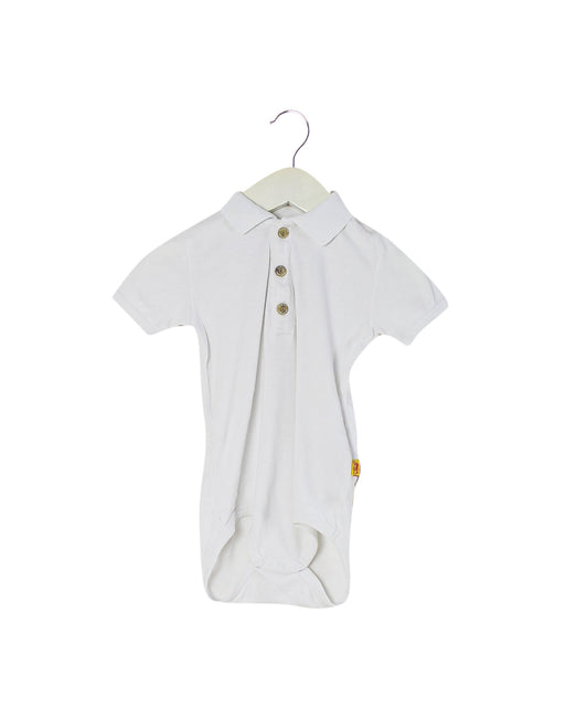 A White Short Sleeve Bodysuits from Steiff in size 12-18M for girl. (Front View)