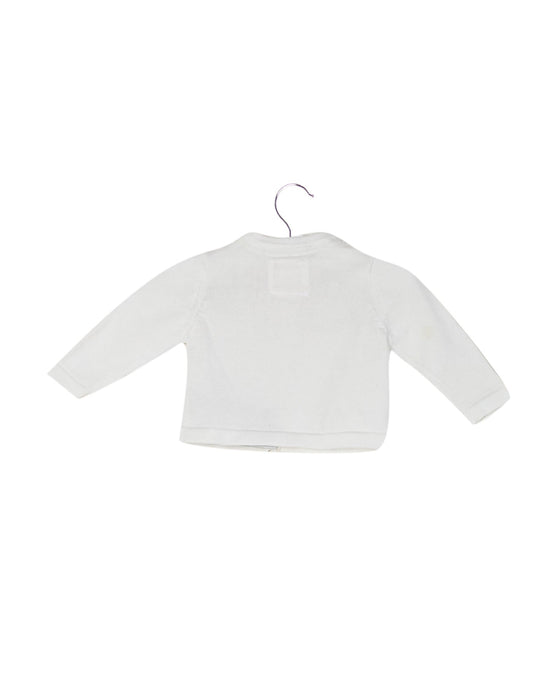 A White Cardigans from Early Days in size 0-3M for girl. (Back View)