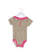 A Brown Short Sleeve Bodysuits from Juicy Couture in size 3-6M for girl. (Front View)