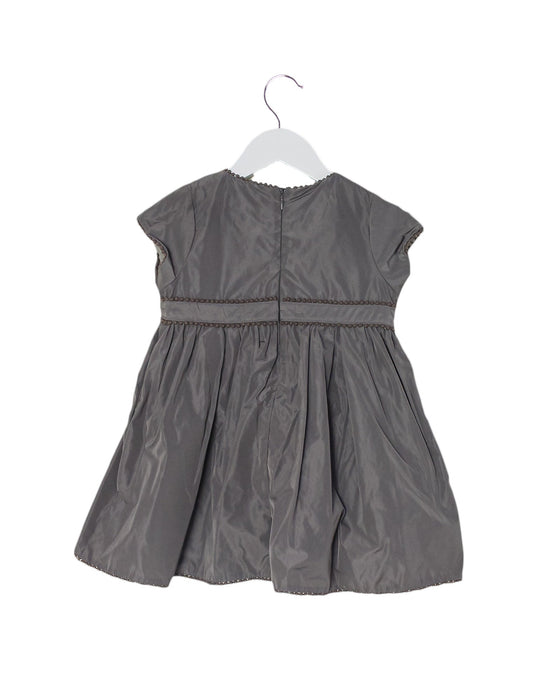 A Grey Short Sleeve Dresses from Château de Sable in size 2T for girl. (Back View)