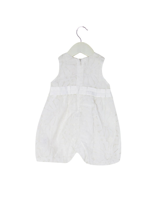 A White Rompers from Chickeeduck in size 6-12M for girl. (Back View)