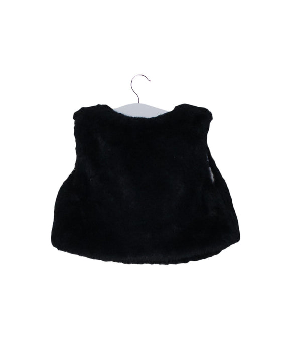 A Black Vests from Marese in size 3-6M for girl. (Back View)