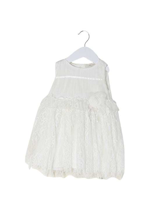 A White Sleeveless Dresses from Miniclasix in size 6-12M for girl. (Front View)