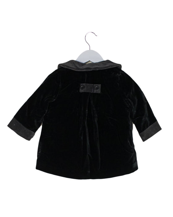 A Black Coats from Marie Chantal in size 6-12M for girl. (Back View)