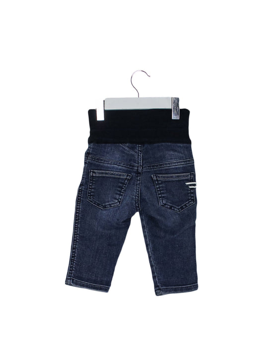 A Blue Jeans from Diesel in size 3-6M for girl. (Back View)